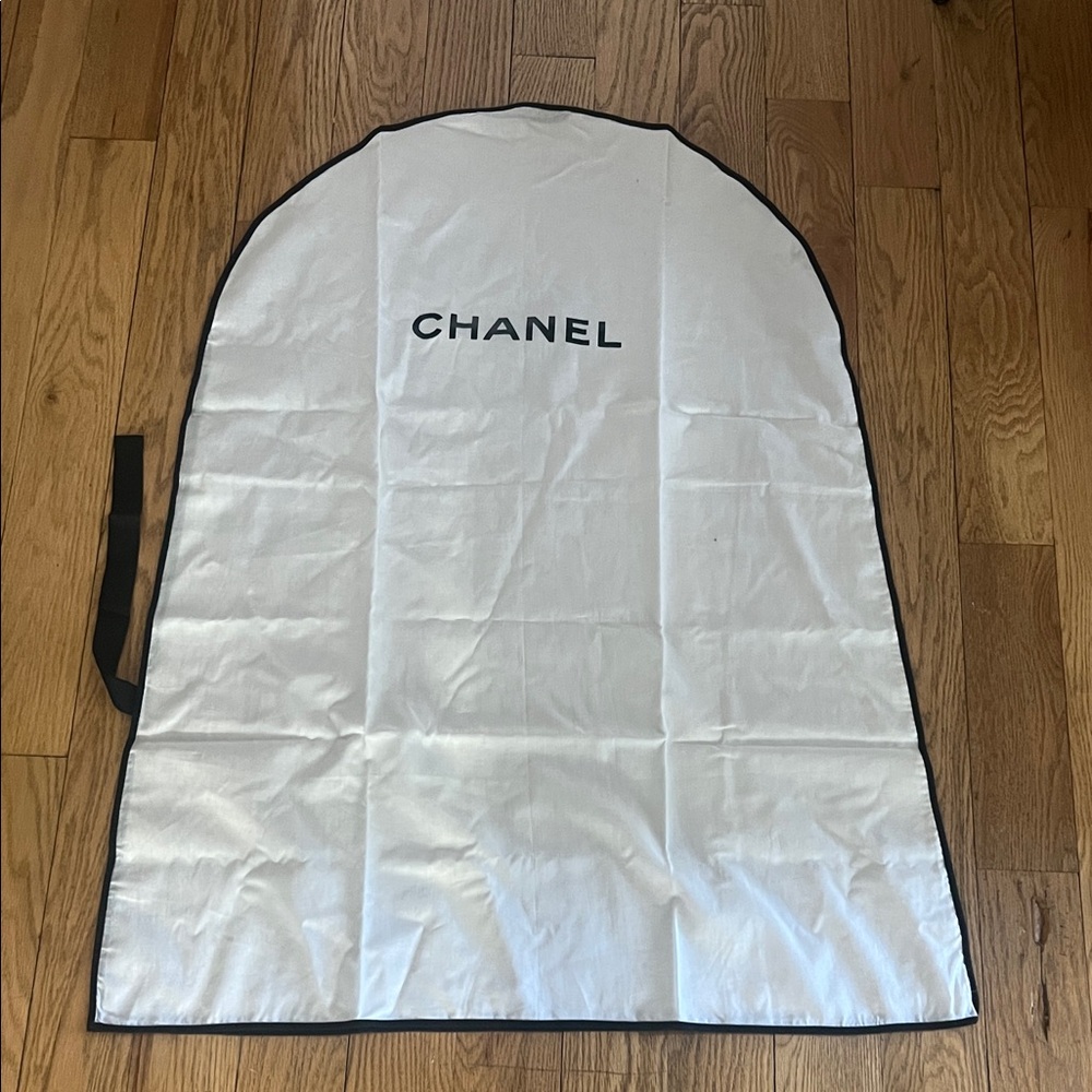CHANEL White Garment Cover with Black Accents
